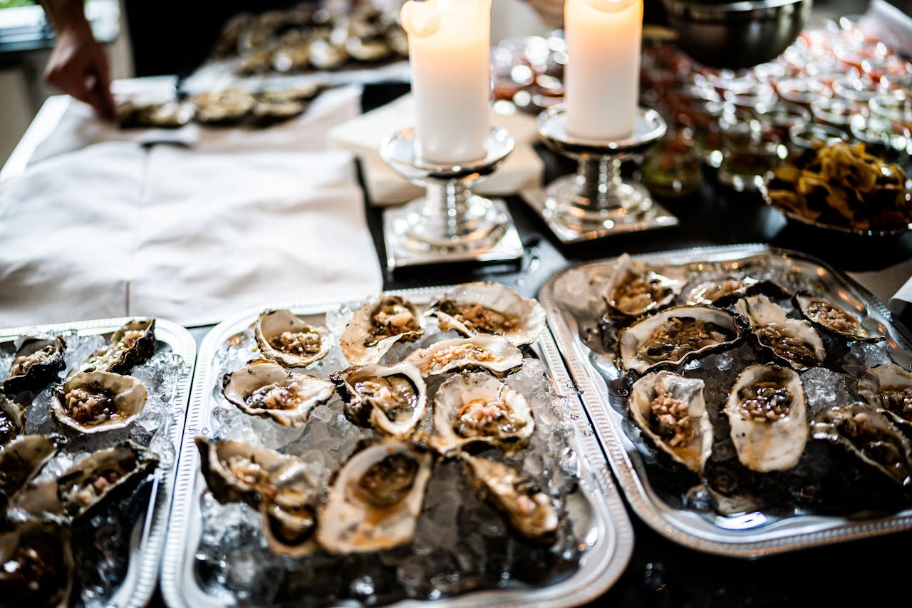 pexels-photo-3217155 Indulge in a luxurious seafood dining experience with a candlelit oyster spread.